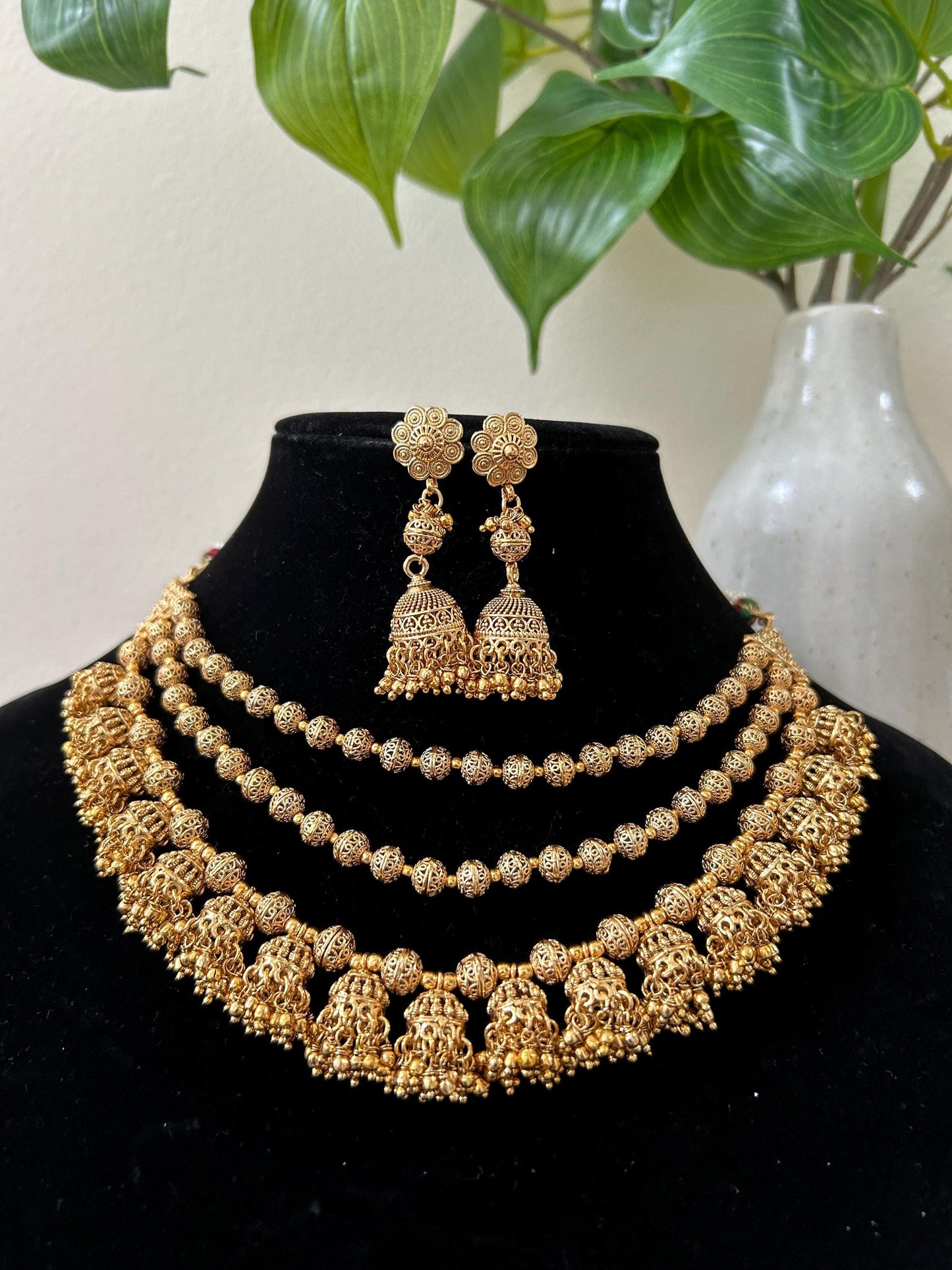 Gold layered necklace set adjustable chain style with jhumkas