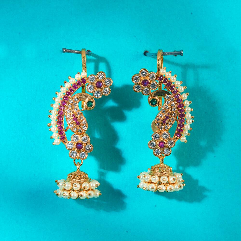 Gold and pearls ear cuff jhumka earrings with american diamonds peacock design gold polished, kaan chain earrings trendy light weight