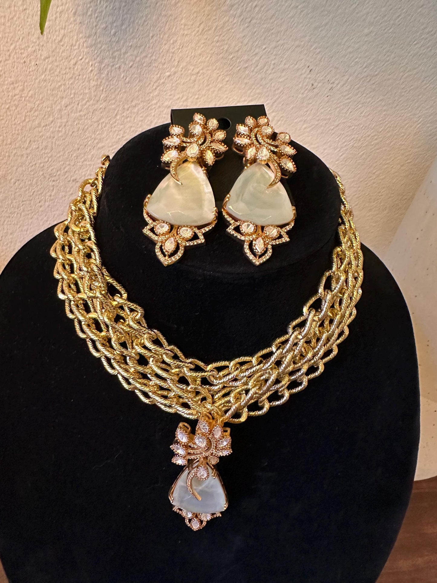 Doublet stone and polki pendant with American diamonds layered chain necklace set in gold polished