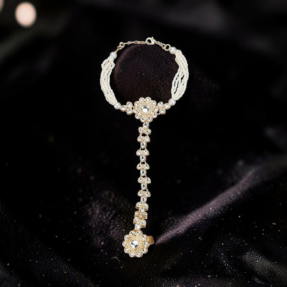Haath Phool hand accessory in kundan and pearls in light gold polish single piece