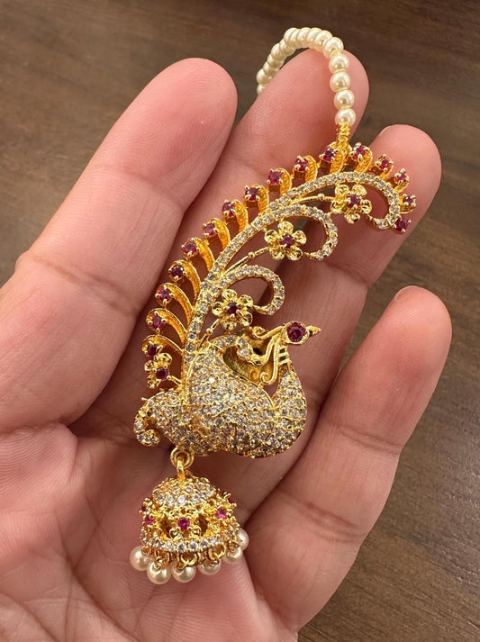 Gold ear cuff jhumka earrings with american diamonds peacock design with pearl ear chain gold polished, kaan chain earrings trendy