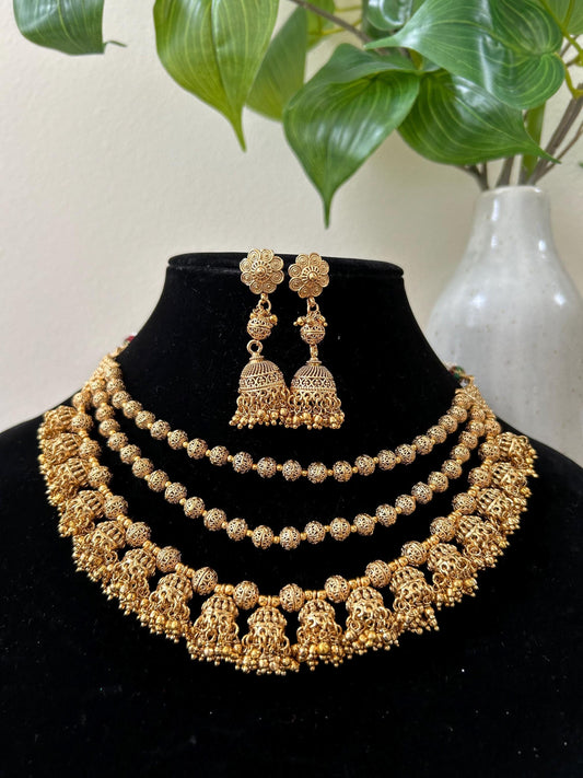 Gold layered necklace set adjustable chain style with jhumkas