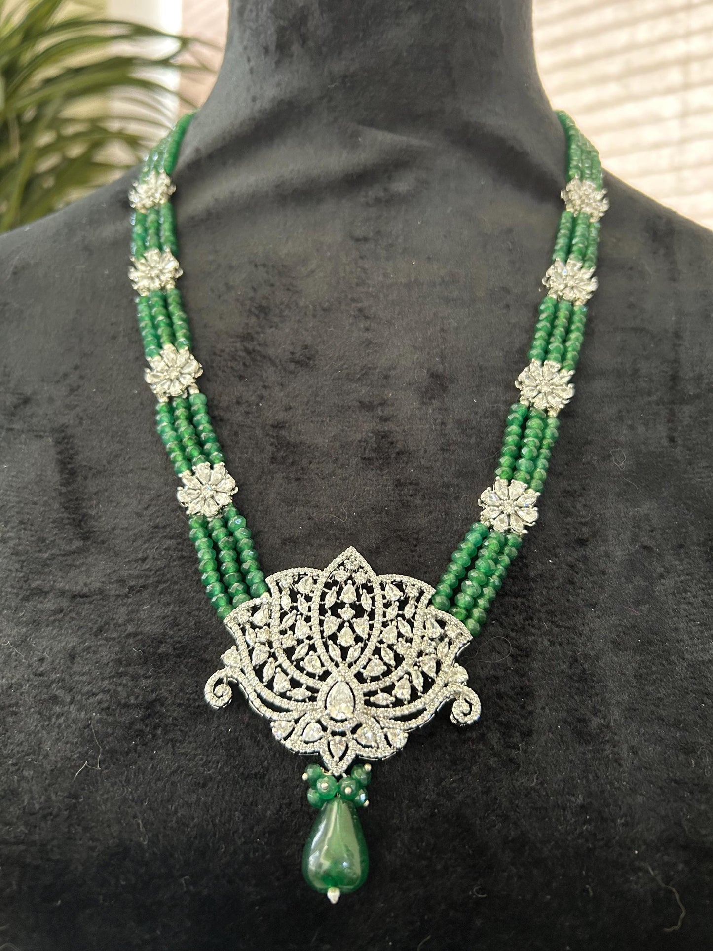 Premium long layered necklace set with emerald beads and American diamonds, adjustable silver polished lotus design