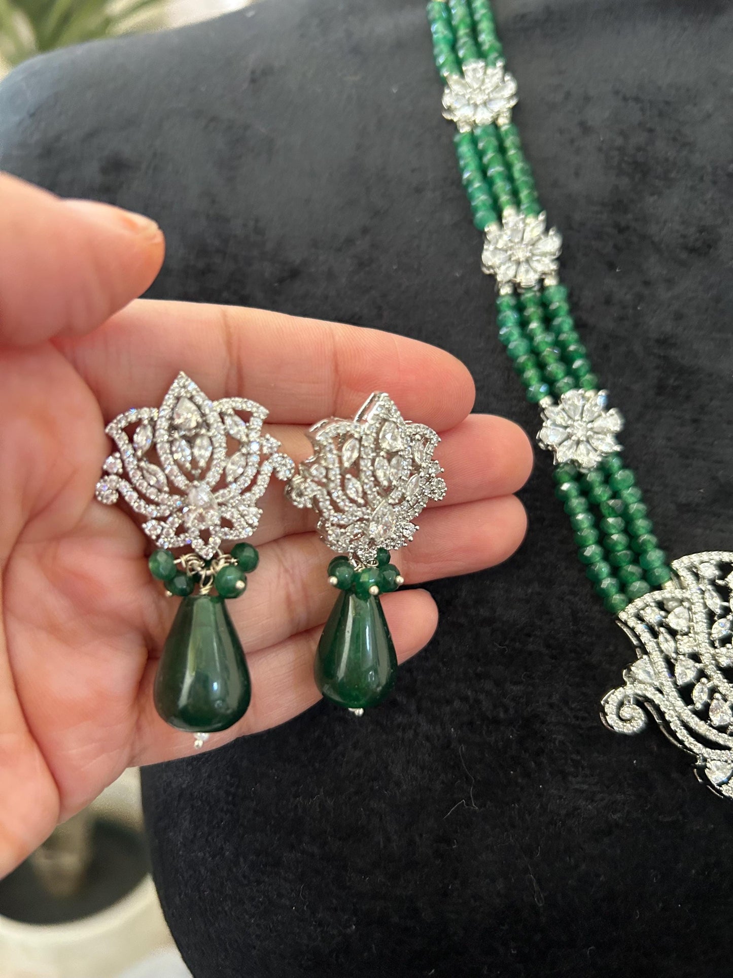 Premium long layered necklace set with emerald beads and American diamonds, adjustable silver polished lotus design