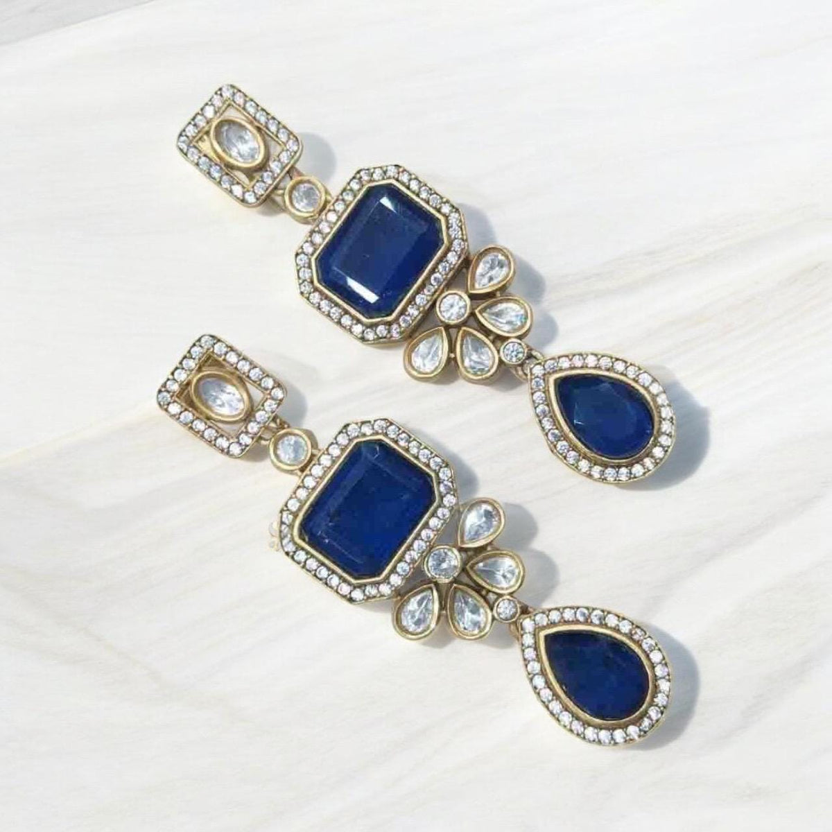 Polki and semiprecious stone earrings with American diamonds