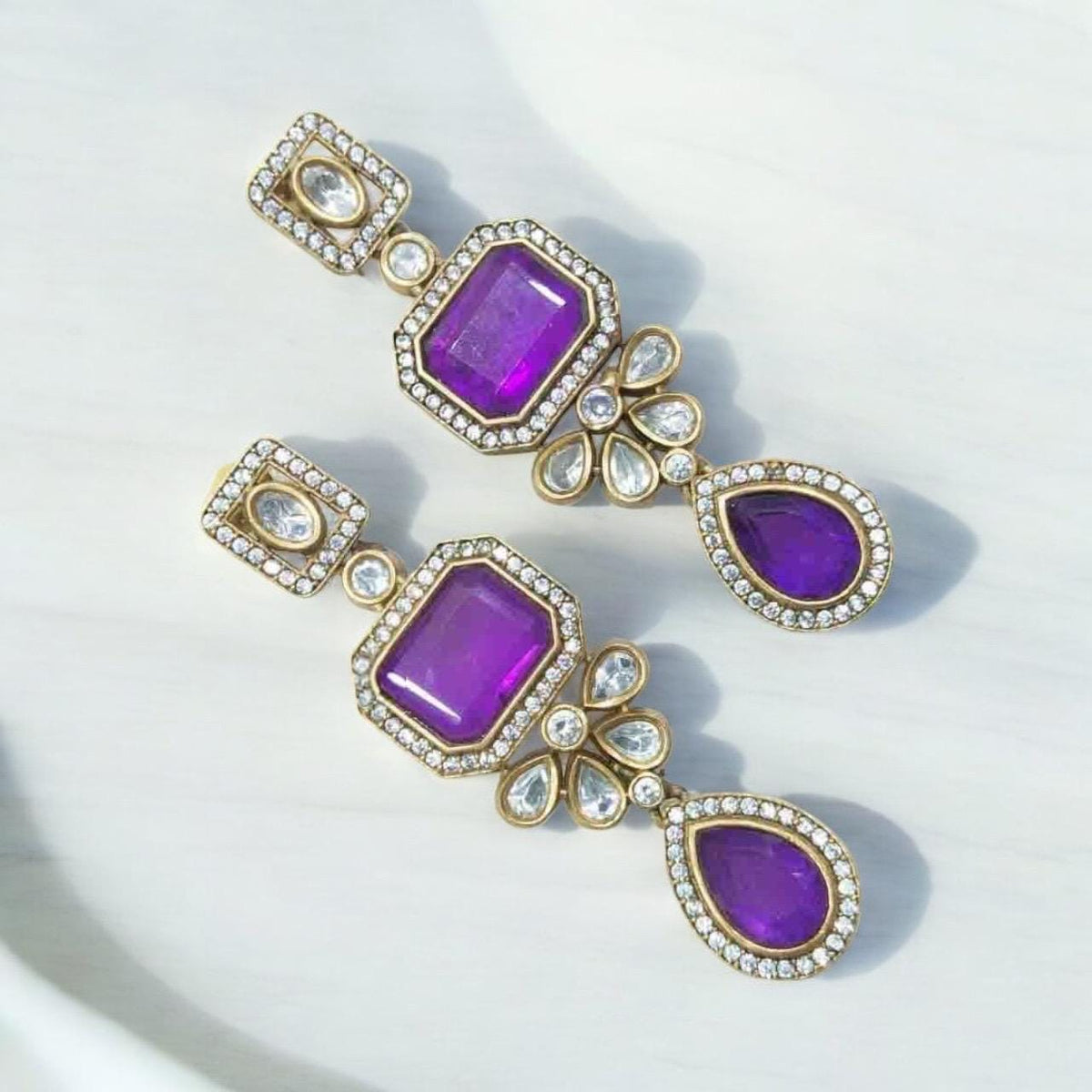 Polki and semiprecious stone earrings with American diamonds
