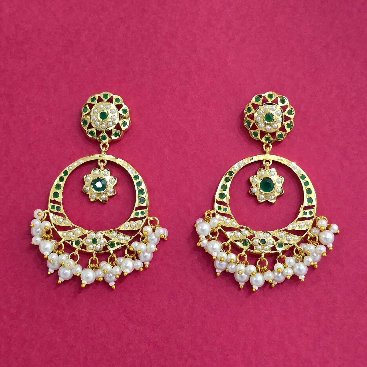 Green diamonds AD, Jadau and pearl jhumkas gold polished chandelier earrings trendy lightweight