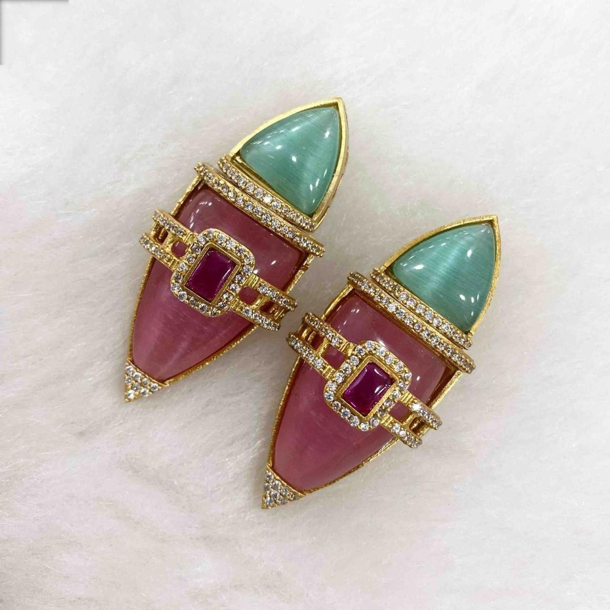 Semiprecious stones boat shaped earrings with american diamonds gold polished