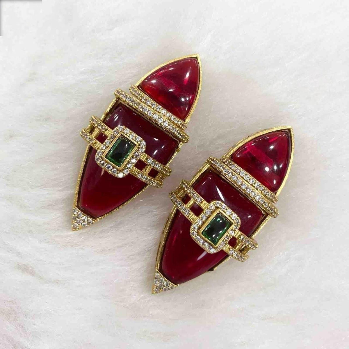 Semiprecious stones boat shaped earrings with american diamonds gold polished
