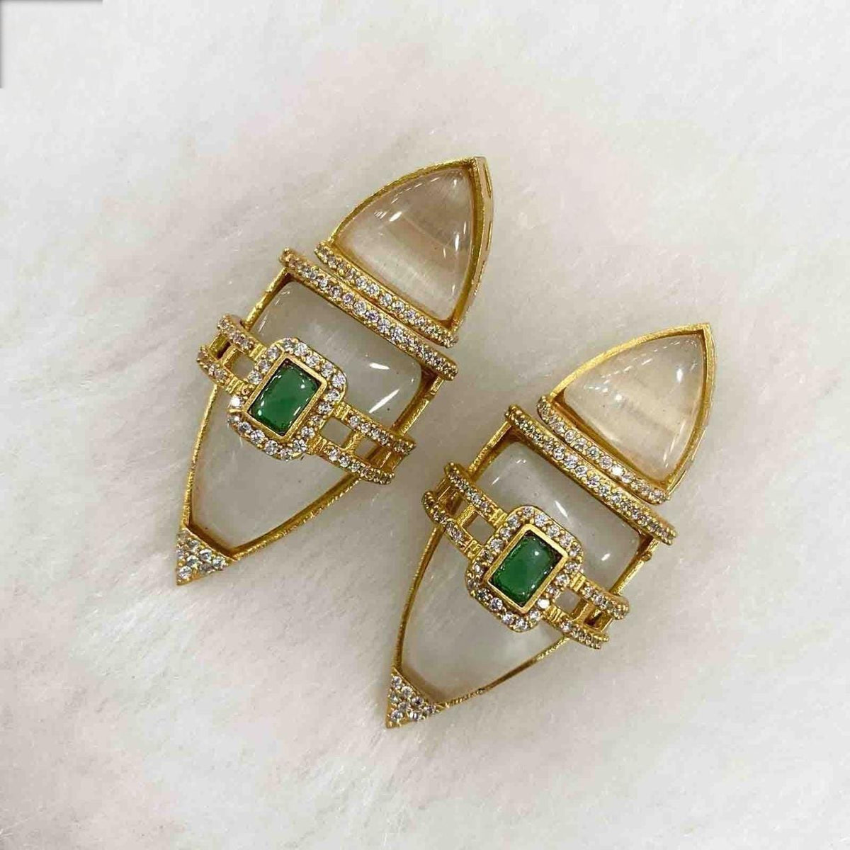 Semiprecious stones boat shaped earrings with american diamonds gold polished