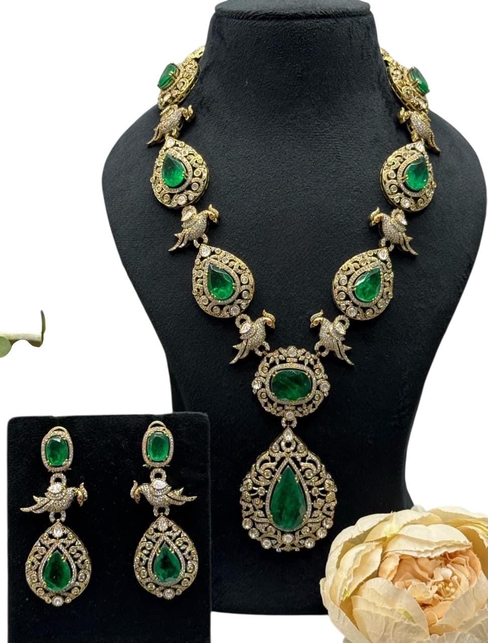 Semi Precious stones, emeralds, Polki: Antique Gold polished with American Diamonds necklace set