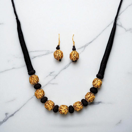 Short black thread work gold necklace set