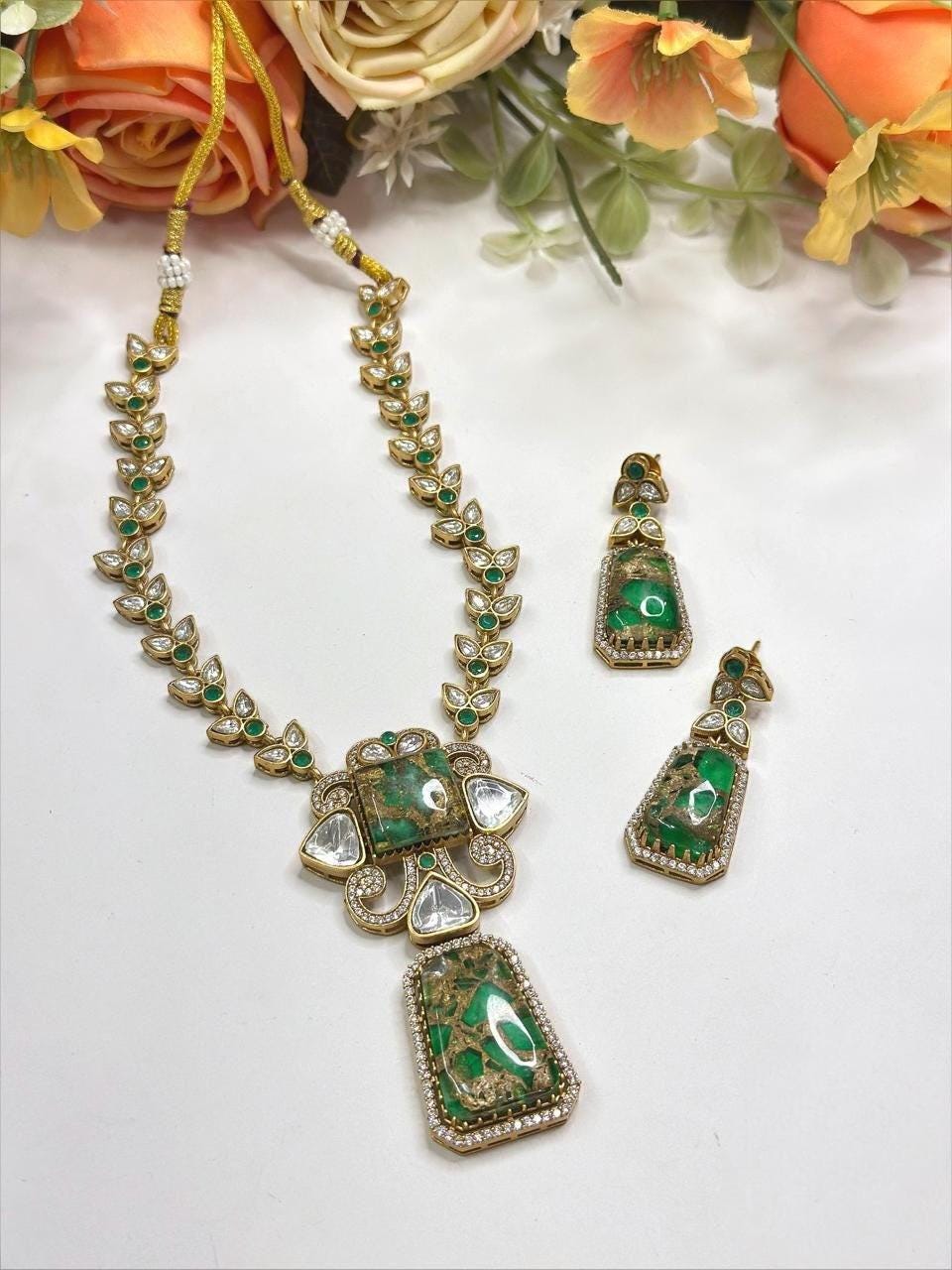 Emerald and gold Stone, Polki: Antique Gold polished with American Diamonds necklace set