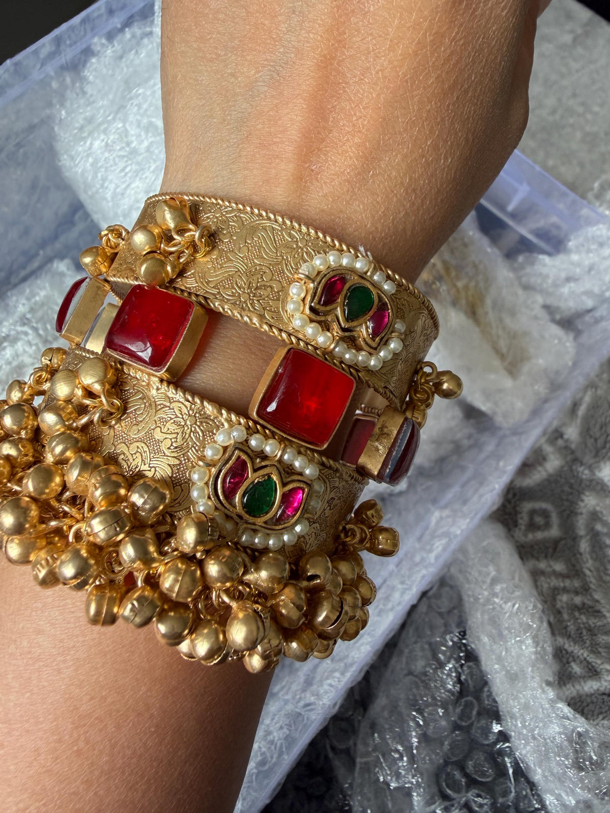 Handcrafted gold polished kada with semiprecious stones and Jadau