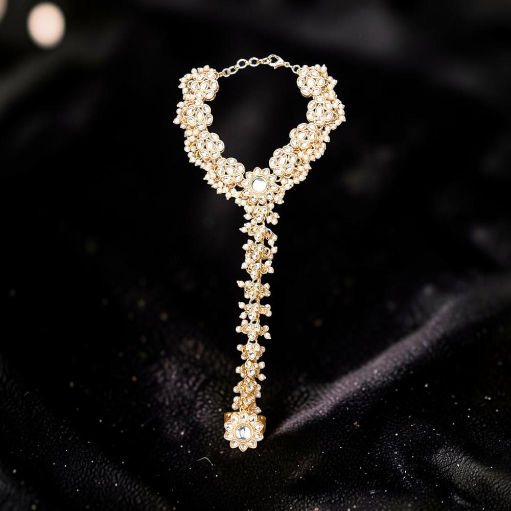 Haath Phool hand accessory in kundan and pearls in light gold polish single piece