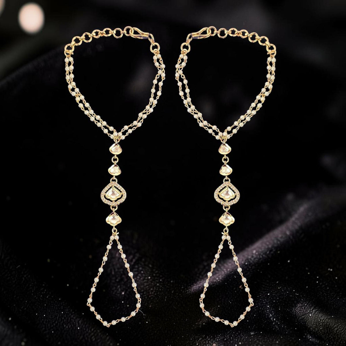 Haath Phool hand accessory in kundan and pearls in light gold polish, set of 2
