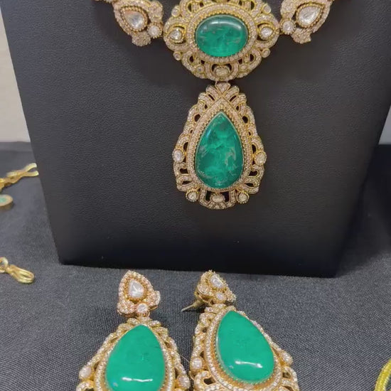 Semiprecious stones Doublet stones, emeralds, Polki: Antique Gold polished with American Diamonds necklace set